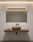 Rain Veil soft taupe vertical stripe wallpaper creating ambiance in a serene bathroom