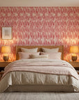 Red Rain textured pink and red vertical stripe wallpaper adding character to a cozy bedroom