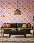Retro Petal Pop bold groovy floral wallpaper in a warm and inviting living room