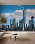 Rising peel and stick wallpaper featuring New York City skyline with One World Trade Center in modern living room