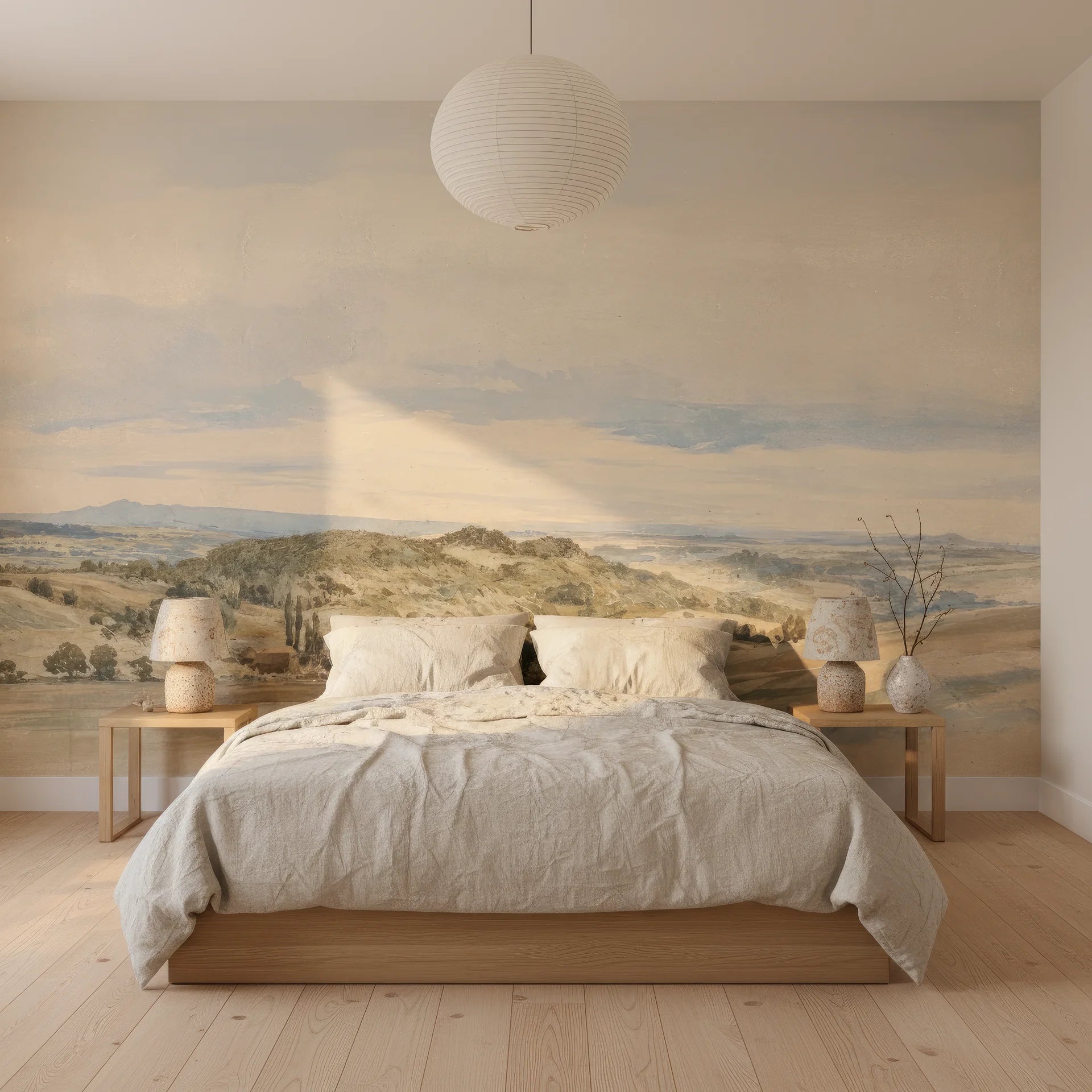 Riverside Landscape mural wallpaper featuring golden hills and cloudy sky in serene bedroom setting