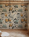 Fun, action-packed wall covering showing construction trucks, heavy machinery, and digging excavators.