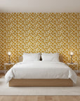 Rolling Fathoms golden painterly leaf wallpaper adding character to a cozy bedroom
