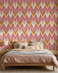 Rose Arrow pink and orange geometric wallpaper adding character to a cozy bedroom