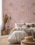 Rose gold metallic, pink, and geometric ogee patterned peel-and-stick wallpaper, named Rose Bloom