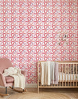 Rose Facet pink geometric peel and stick wallpaper bringing warmth to a peaceful nursery