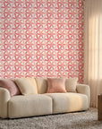Rose Facet pink geometric peel and stick wallpaper in a warm and inviting living room