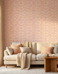 Rose Linen pink and peach geometric wallpaper in a warm and inviting living room