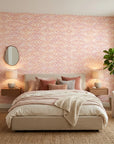 Rose Linen pink and peach geometric wallpaper adding character to a cozy bedroom