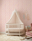 Rose Linen pink and peach geometric wallpaper bringing warmth to a peaceful nursery