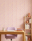 Rose Linen pink and peach geometric wallpaper as a feature wall in a bright home office