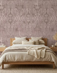 Rose Resist textured mauve abstract wallpaper adding character to a cozy bedroom