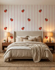 Ruby Streams ladybug stripe wallpaper adding character to a cozy bedroom