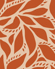 Abstract leaf motif peel-and-stick wallpaper in beige and terracotta colors, pattern Rust Echoes