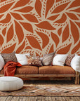 Self-adhesive wall covering featuring an abstract botanical motif in earthy terracotta and beige tones