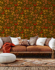 A deep chocolate-brown wallcovering adorned with vibrant orange foliage and small red fruits