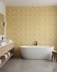 Saffron Hush warm gold chrysanthemum wallpaper creating ambiance in a serene bathroom