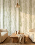 Sage Rainfall neutral toned vertical stripe wallpaper in a warm and inviting living room