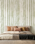 Sage Rainfall neutral toned vertical stripe wallpaper adding character to a cozy bedroom