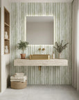 Sage Rainfall neutral toned vertical stripe wallpaper creating ambiance in a serene bathroom