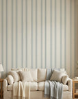 Sage Ritual serene blue striped wallpaper in a warm and inviting living room