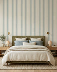 Sage Ritual serene blue striped wallpaper adding character to a cozy bedroom