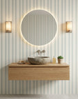 Sage Ritual serene blue striped wallpaper creating ambiance in a serene bathroom