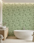 Sage Swan green pastoral toile wallpaper creating ambiance in a serene bathroom