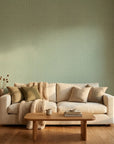 Sage Trellis serene geometric wallpaper in a warm and inviting living room