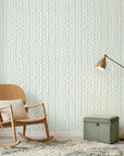 Sage Wave serene green lines wallpaper adding character to a cozy bedroom