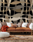 Self-adhesive wallpaper featuring an abstract design of brown and tan undulating geometric lines - Sandy Strands