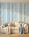 Sapphire Bead coastal blue stripe wallpaper in a warm and inviting living room