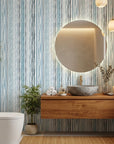 Sapphire Bead coastal blue stripe wallpaper creating ambiance in a serene bathroom