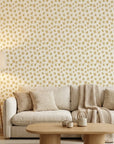 Scattered Gold neutral floral peel and stick wallpaper in a warm and inviting living room