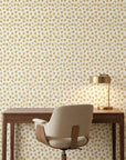 Scattered Gold neutral floral peel and stick wallpaper as a feature wall in a bright home office