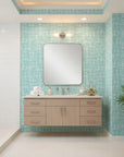 Sea Glass Grid teal abstract wallpaper creating ambiance in a serene bathroom