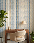 Seashore Dot blue and beige striped wallpaper as a feature wall in a bright home office