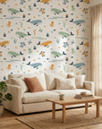 Seaside Play playful ocean nursery wallpaper in a warm and inviting living room