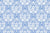 Traditional Secret Arbor wallpaper featuring ornate white damask motifs on soft periwinkle blue background