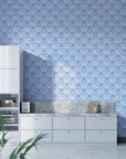 Blue and white Secret Arbor damask wallpaper with ornate medallion pattern in modern white kitchen