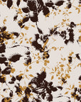 Self-adhesive wallpaper featuring an aged black and brown floral silhouette pattern (Shadow Luxe)