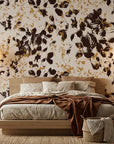 Shadow Luxe cream and brown distressed floral silhouette wallpaper adding character to a cozy bedroom