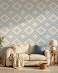 Shifting Current blue geometric peel and stick wallpaper in a warm and inviting living room