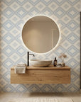 Shifting Current blue geometric peel and stick wallpaper creating ambiance in a serene bathroom