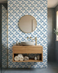 Signal & Edge blue geometric peel and stick wallpaper creating ambiance in a serene bathroom