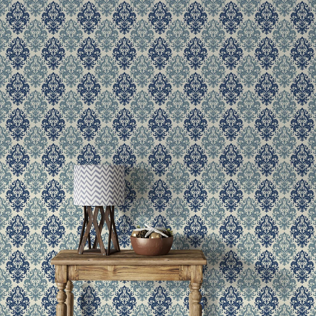 Silent Bouquet removable wallpaper on rustic console with navy and sage damask pattern