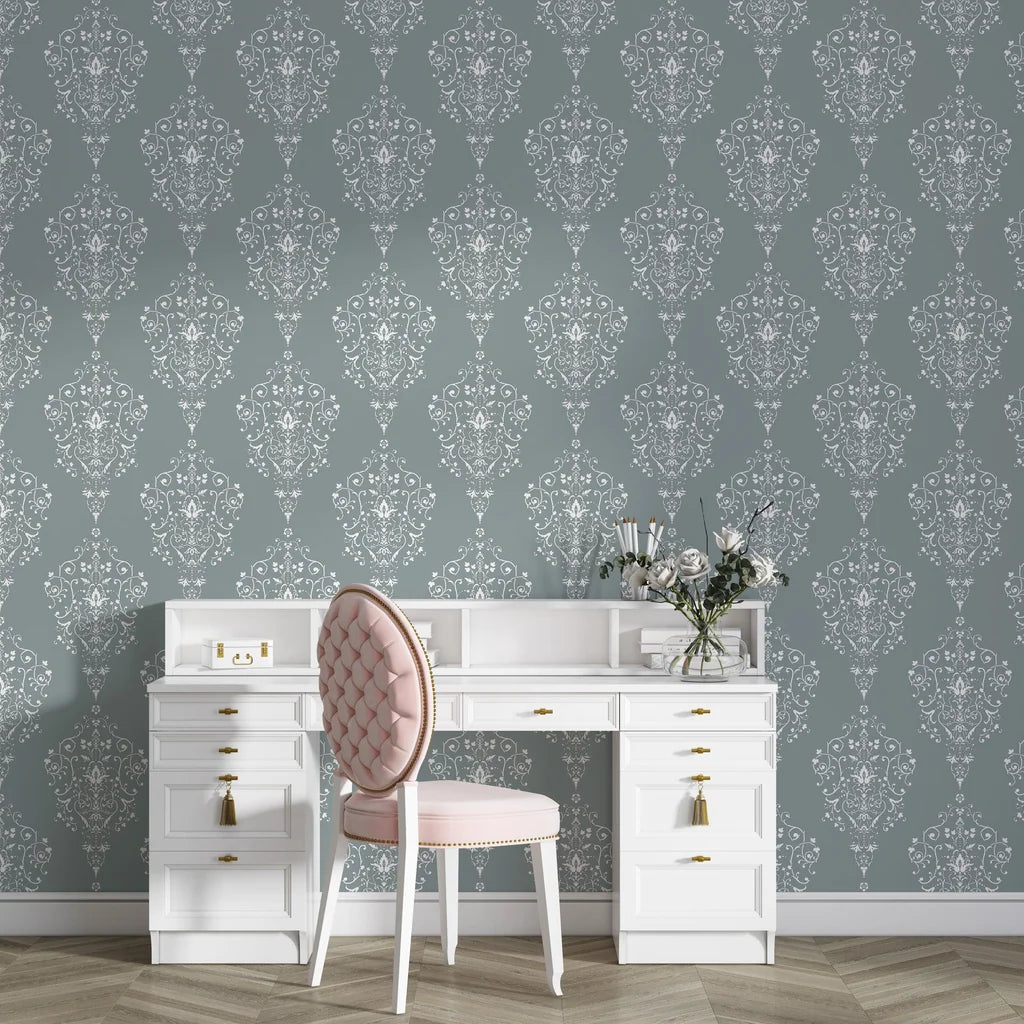 Silent Spring removable wallpaper in sage green with white damask medallions behind elegant vanity desk