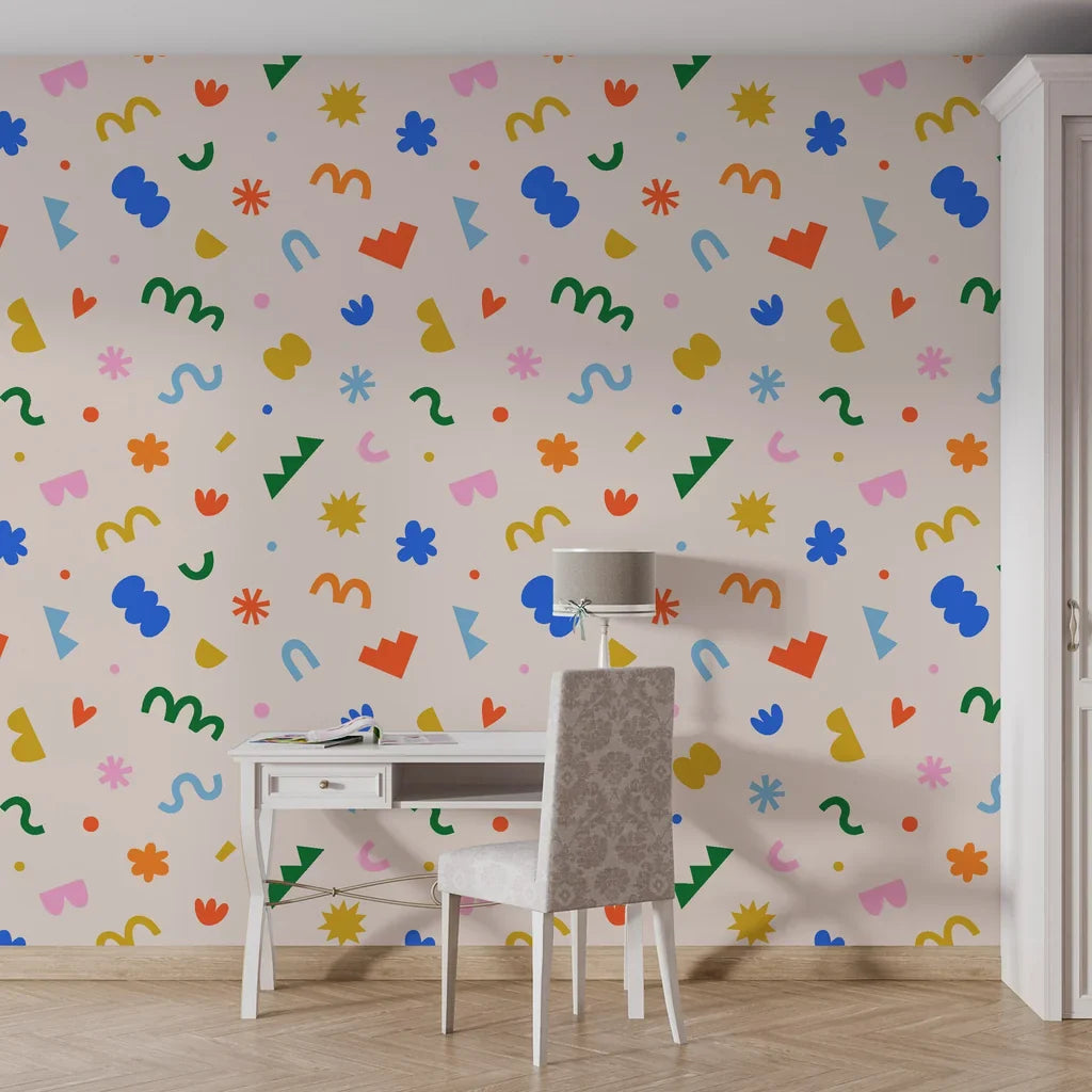 Neutral beige backdrop featuring vibrant abstract geometric paper-cutout patterns on self-adhesive wallpaper - Silly Shapes