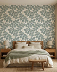 Silver Dollar gray botanical peel and stick wallpaper adding character to a cozy bedroom