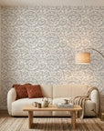 Silver Eddy soft grey abstract swirl wallpaper in a warm and inviting living room